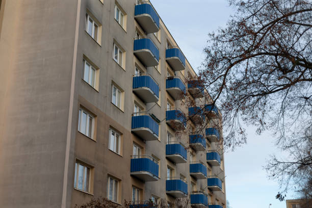 istock A tall building featuring blue balconies adorning its side surface 2197873463