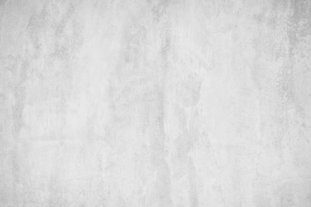 istock Concrete bare stone texture for background, grey and white colors.  Backdrop cement and sand wall of tone vintage grunge outdoor bare concrete texture. Building rough pattern floor decorating empty. 2197875812