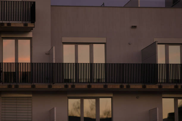 istock Modern Residential Building Facade with Balconies and Windows 2197876032
