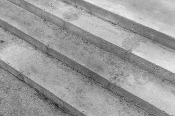 istock Steps leading up to a modern building in black and white contrast 2197876257