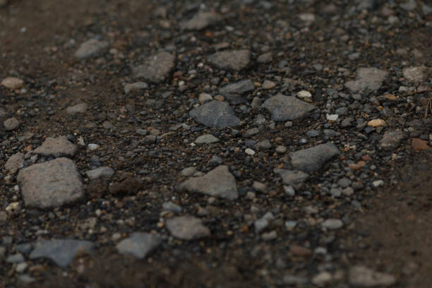 istock Ground Surface with Gravel and Small Stones in Outdoor Setting 2197879063