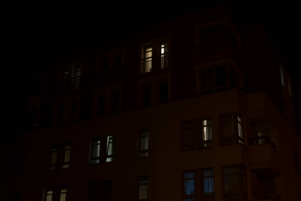 istock A highrise building featuring numerous windows is brightly lit up at night 2197880365