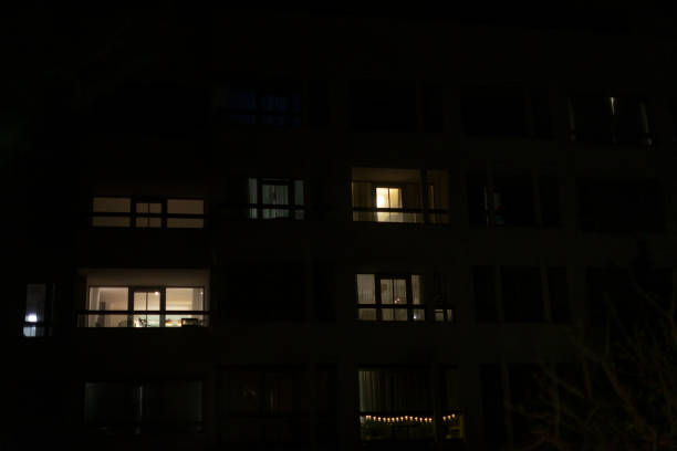 istock A multistory building that has many windows is beautifully lit up at night 2197880786
