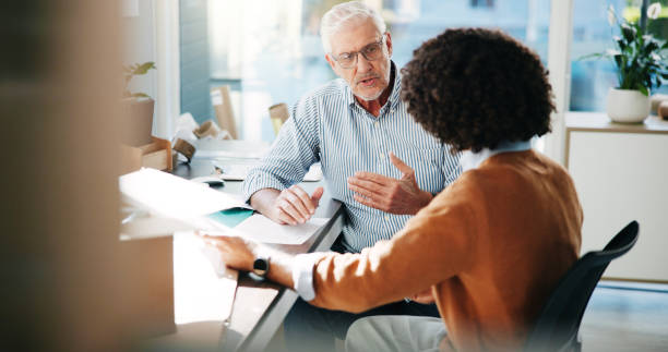 istock Small business, team and men planning distribution, logistics and training with manager in warehouse. Talking, shipping and discussion for delivery, ecommerce inventory and coaching for supply chain 2197889448