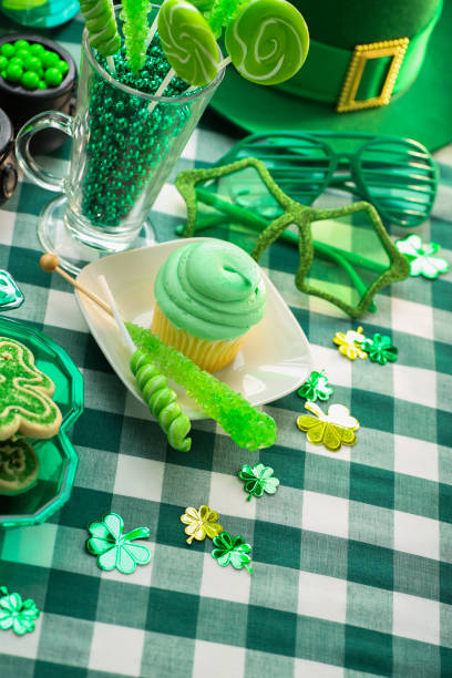 istock St. Patricks Day party with green cupcake and candy 2197890410