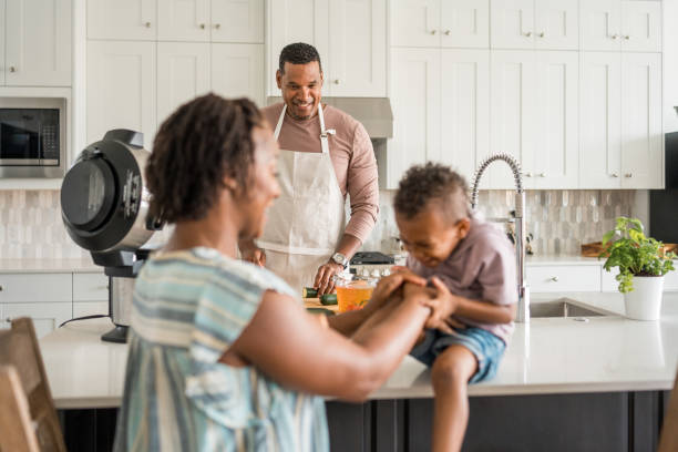 istock Diverse Family Engages in Cooking Activities in Home Kitchen 2197891227