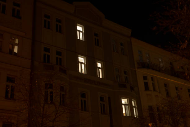 istock The illuminated windows of the building facade create a unique atmosphere 2197893816