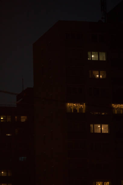 istock Night View of Building with Illuminated Windows in Urban Setting 2197894126