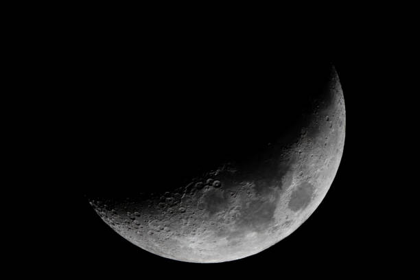 istock Crescent Moon Close-Up Featuring Detailed Craters in the Night Sky 2197896274