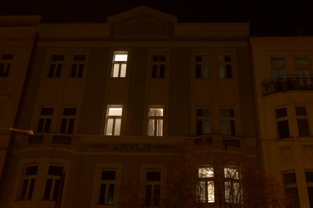 istock A tall building has its windows illuminated brightly during the night 2197898126
