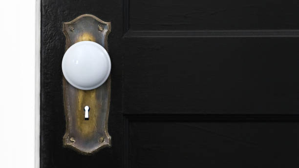 White doorknob with skeleton keyhole