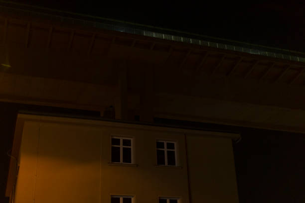 istock Night View of Building Underneath a Bridge with Illuminated Background 2197903947