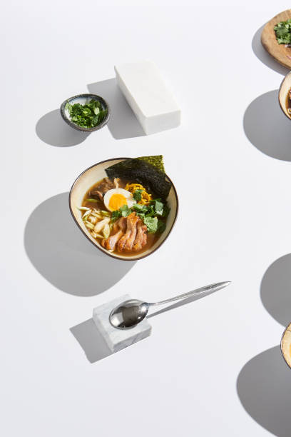 istock Modern Minimalist Chicken Ramen Photography with Bright Lighting and Shadow Play 2197908276