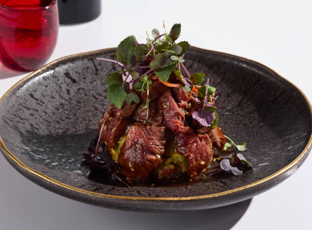 istock Elegant Beef Tataki with Avocado Mousse on Textured Plate 2197908638