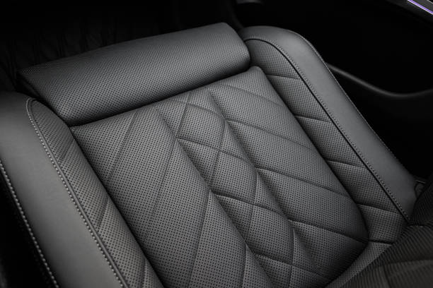 istock Black Quilted Perforated Leather Seat Surface Details in Car 2197912747