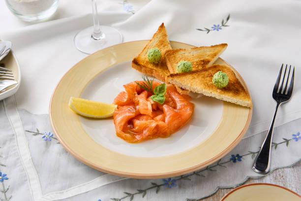 istock Elegant Composition of Lightly Salted Salmon with Toasts on a Sophisticated Table Setting 2197913109