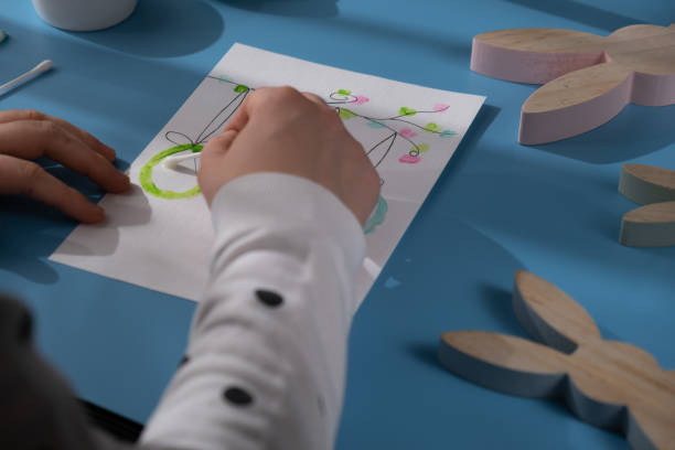 istock EASTER eggs painting Sustainable preparation Diy process of making handmade greeting cards. Step by step activity for children. Inclusive and responsible stress relief holiday hobby 2197913385