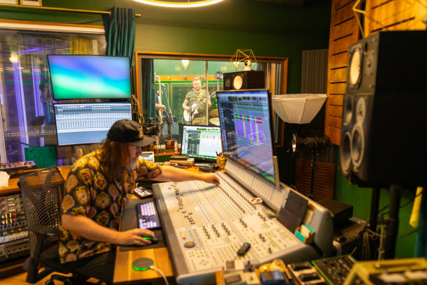 istock Producer mixing music in the recording studio 2197914554