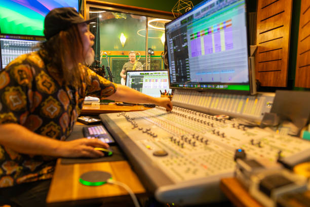 istock Producer mixing music in the recording studio 2197914577