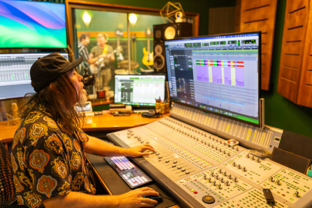 istock Producer mixing music in the recording studio 2197914595