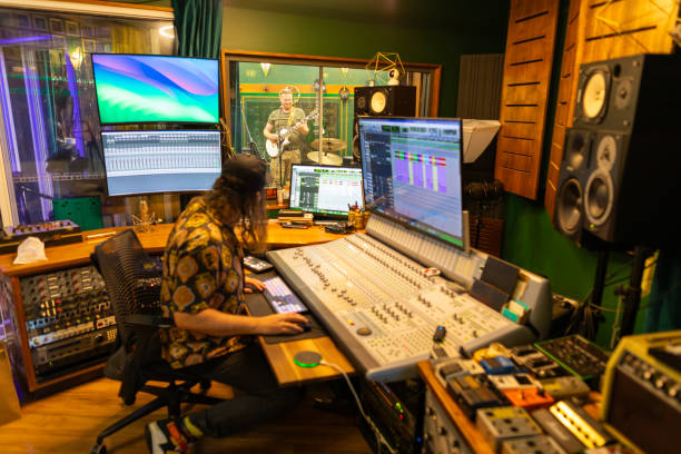 istock Producer mixing music in the recording studio 2197914620