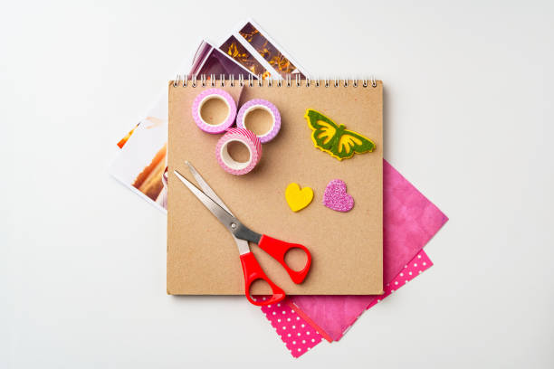 istock Crafting materials arranged for a colorful creative project on a white background 2197914678