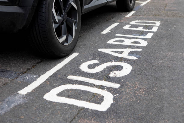 istock Close-up of a car in a disabled parking space 2197916300