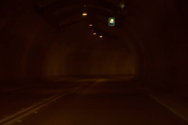 driving car in tunnel.