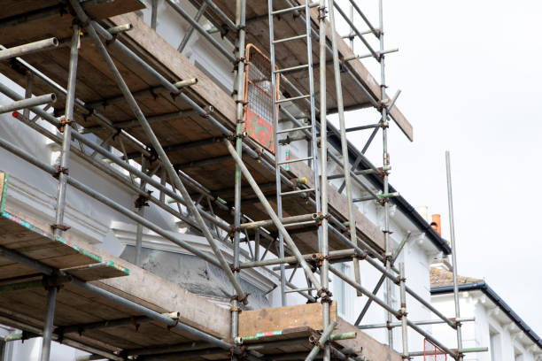 istock Scaffolding on a white coloured house 2197918578