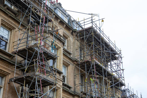 istock Scaffolding on a large apartment building 2197918633