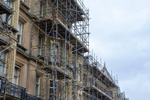 istock Scaffolding on a large apartment building 2197918639