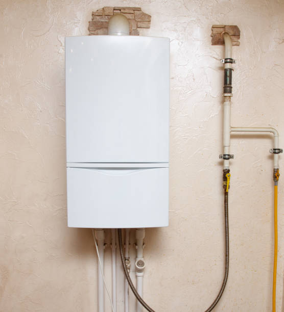 istock A white water heater is mounted on a wall 2197918880