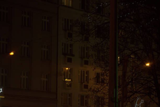 istock A night scene of a brightly lit building facade surrounded by trees 2197919096