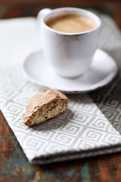 istock Cantuccini (Italian cookie) and a Cup of coffee on rustic wooden background. Close up. Copy space. 2197920696