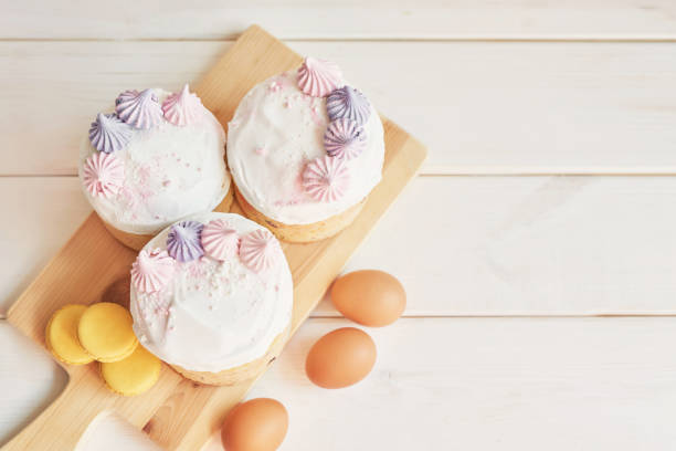 Meringue kisses in white homemade with egg white on white background