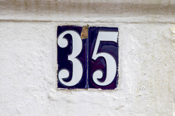 istock House number 35 on blue ceramic tiles 2197922188