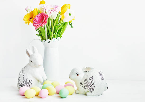 istock Easter composition with sweet bread, Easter cake, eggs, bouquet of flowers. Holidays breakfast concept with copy space. Traditional easter cake with gingerbread cookies. Easter Greeting Card Template 2197922521
