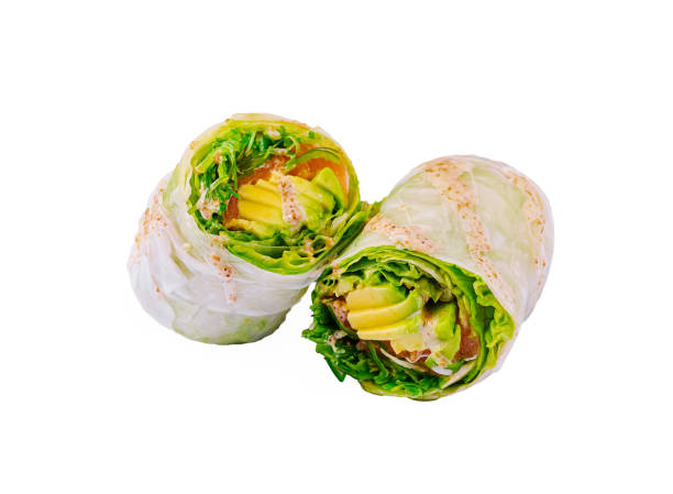 Wraps filled with fresh vegetables and sauces create a vibrant dish perfect for a healthy meal or snack option