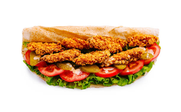 istock Crispy fried chicken sandwich with fresh vegetables on toasted bread served at lunchtime 2197929514