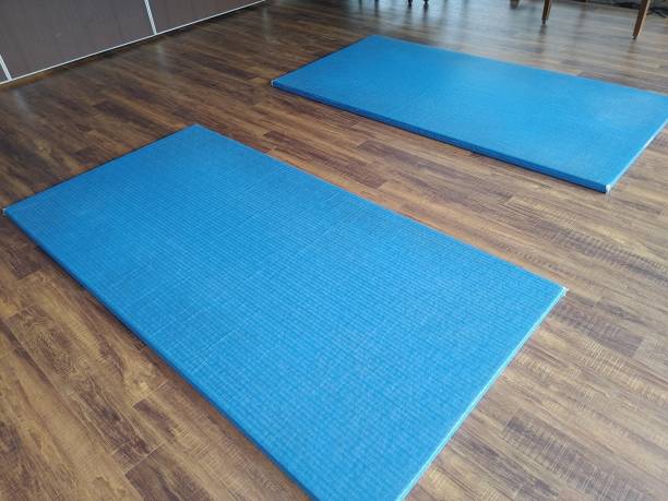 istock Yoga mat on the floor 2197929922