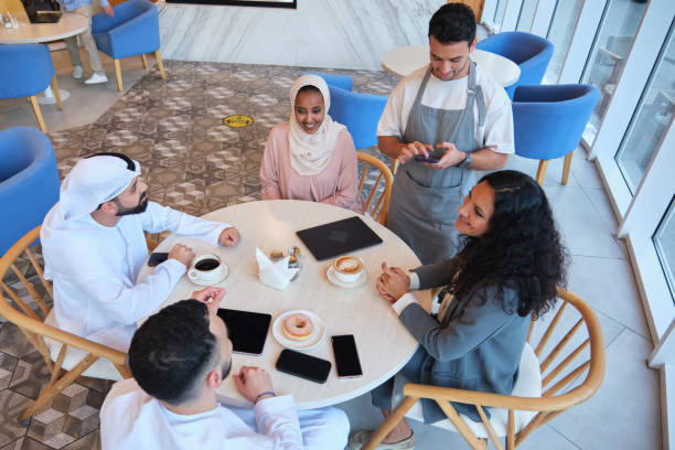 istock High angle view of customer ordering at cafe 2197936172