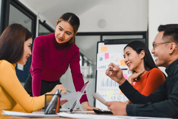 istock Team collaboration in modern office with cheerful discussion 2197936521