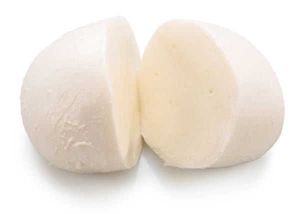 istock Ball of mozzarella cheese cut in half on white background. File contains clipping path. 2197938100