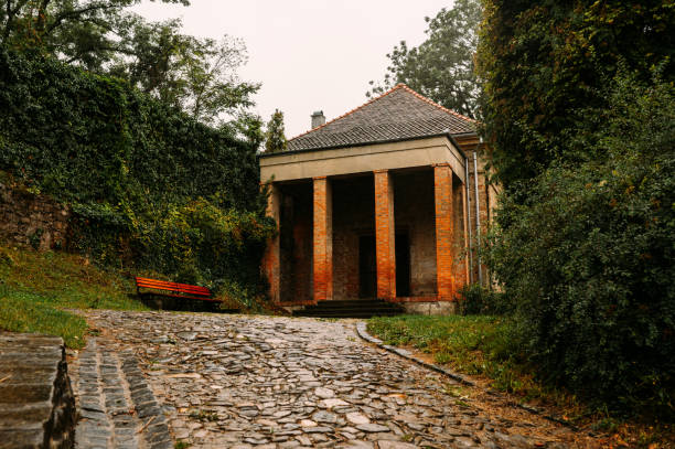 istock On a serene rainy day, the classical temple structure stands elegantly amid lush greenery 2197940561