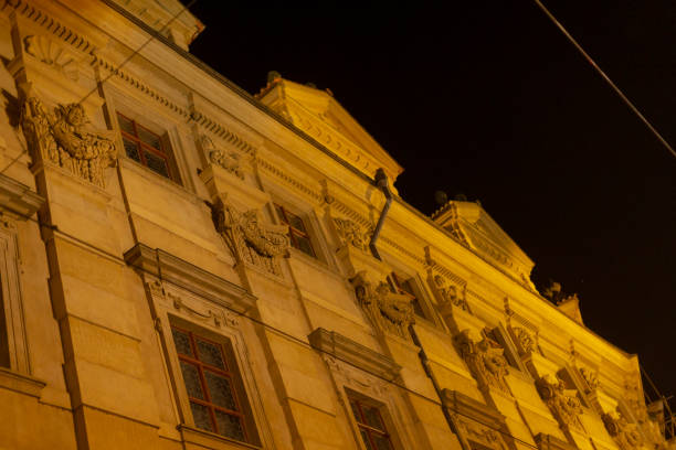 istock A large building featuring numerous windows is beautifully lit up at night 2197943008