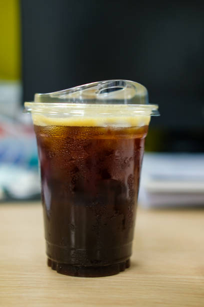 istock A plastic cup black coffee or iced americano in a cup with a lid at office 2197944421