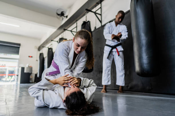 istock Females training Jiu-jitsu at the gym 2197954848