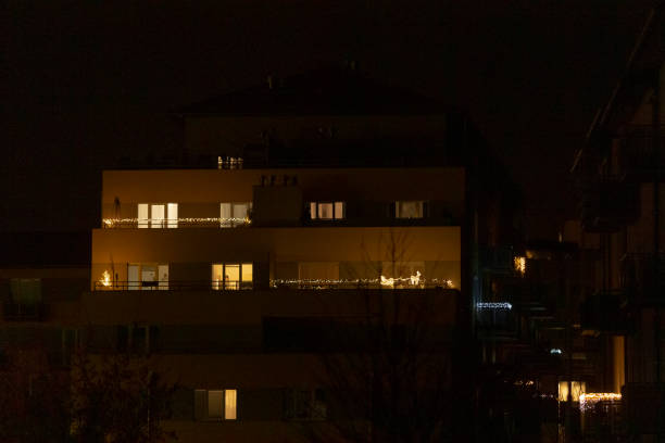 istock A large building with many windows is beautifully lit at night 2197962662
