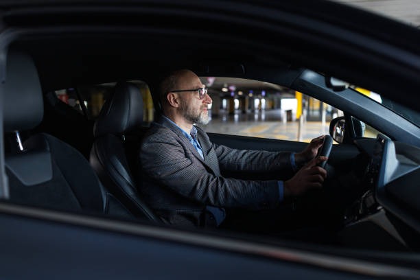 istock A well-dressed man in the car 2197965563