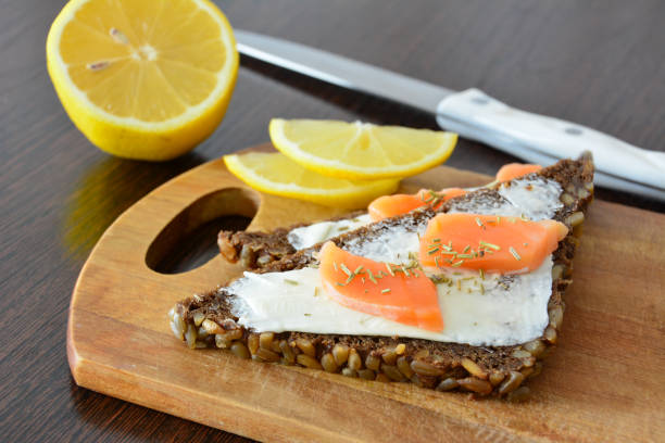 Smoked Salmon Rye Bread Sandwich on a cutting board